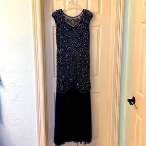 Lovely, navy blue evening gown. Size Large. Still in excellent condition.